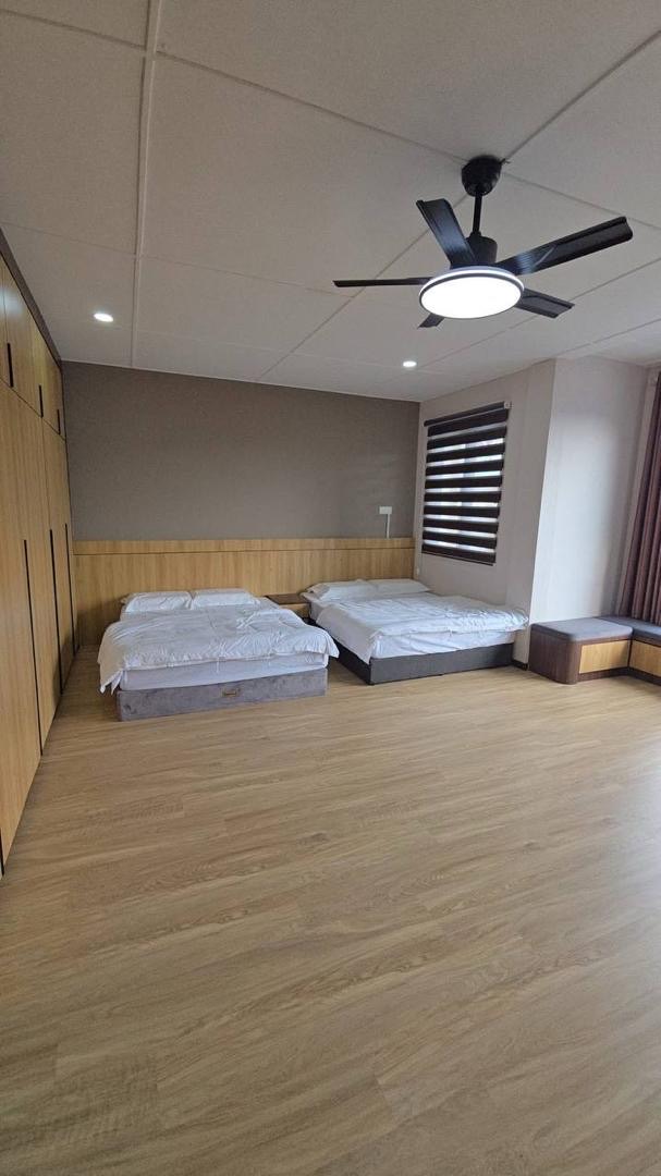 Large family bedroom with two beds