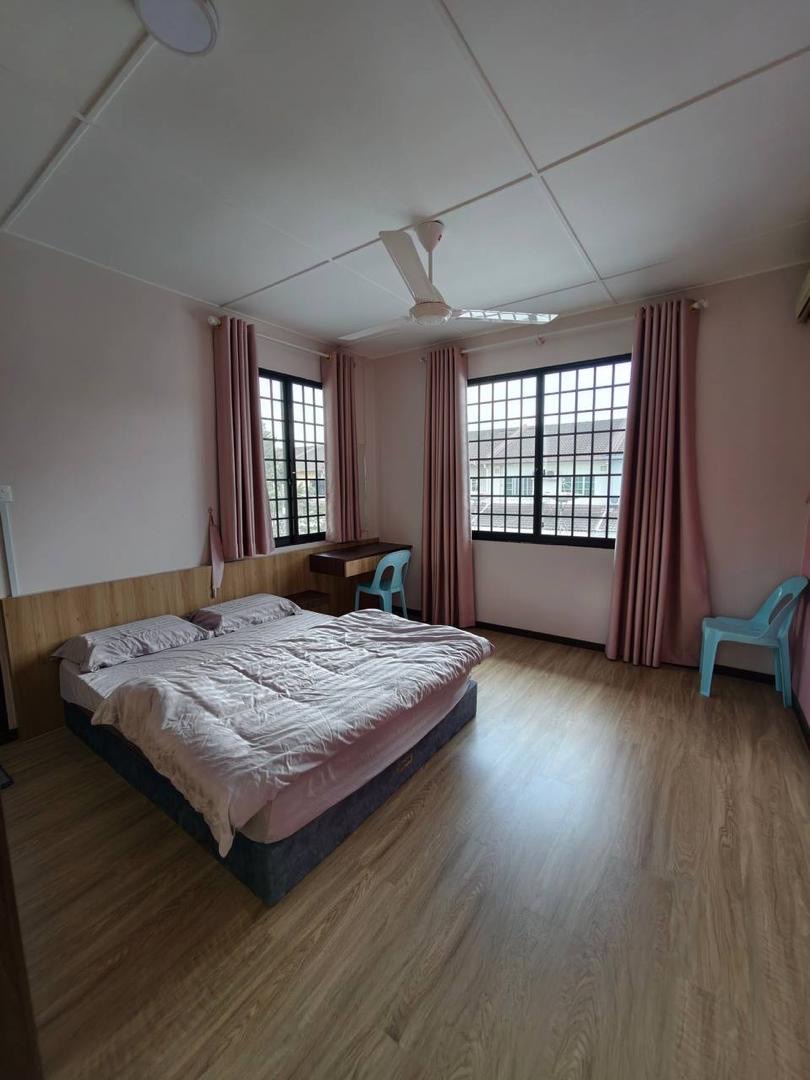 Bright bedroom with two windows